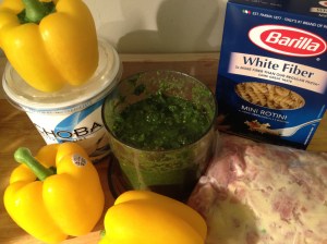 Chicken marinating on the right. Cilantro sauce in the middle.