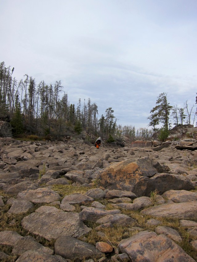 Will is that tiny orange speck under the silver canoe. 